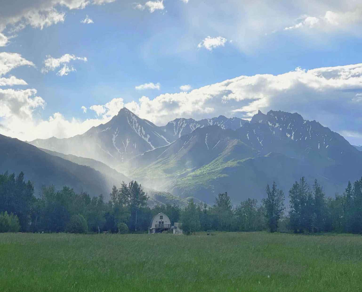 Alaska luxury lodging barn field view