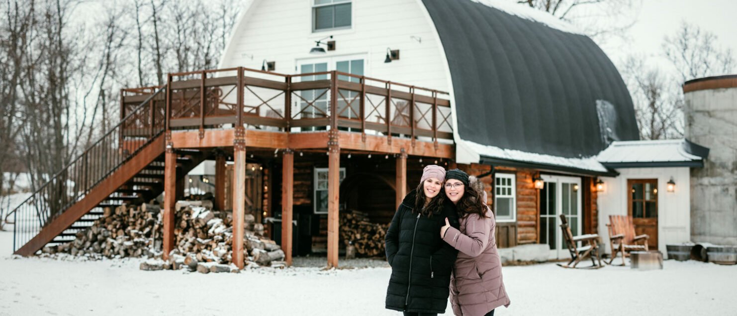 Amber and Jennifer outside mountain field farm